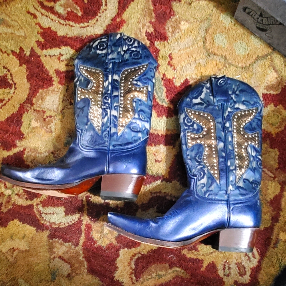 FRYE Cowboy boots. Embellished with gold tone studs. Pull on.